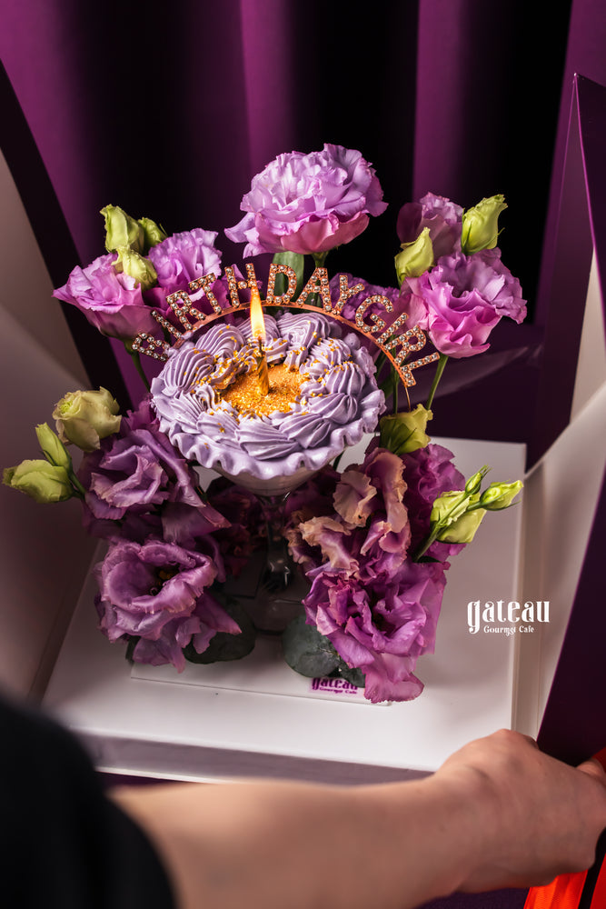 Purple floral custom birthday cakes for her with decorative flowers from Gateau Gourmet Cafe