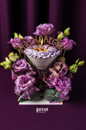 Elegant custom birthday cakes for her with purple flowers arranged by Gateau Gourmet Cafe