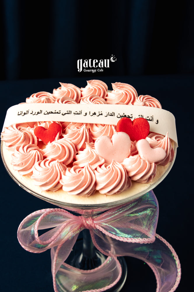 Gateau Gourmet Cafe pink frosted cake with heart decorations custom cakes for Mother's Day