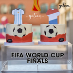 Two soccer-themed cakes with custom edible cake prints for FIFA World Cup Finals celebration
