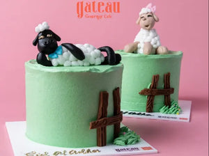 Custom Eid desserts featuring green frosted cakes topped with sheep figurines for a festive celebration