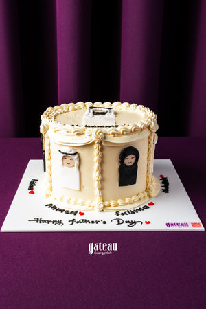 Custom Father's Day cake from Gateau Gourmet Cafe with decorated portraits and cream frosting