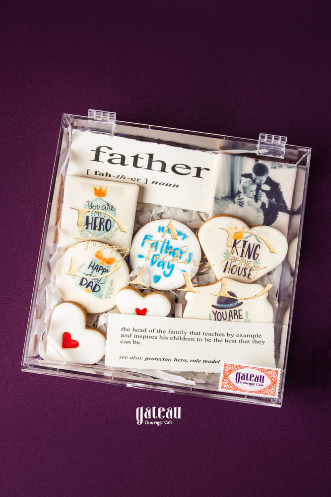 Custom Father's Day cookies decorated with messages and designs by Gateau Gourmet Cafe in clear gift box