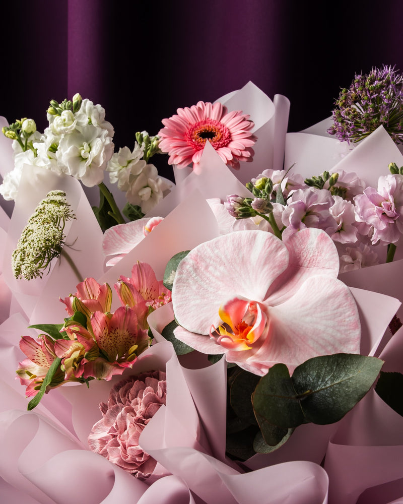 Custom flower bouquet services featuring a variety of colorful blooms and elegant arrangements