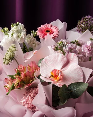 Custom flower bouquet services featuring a variety of colorful blooms and elegant arrangements