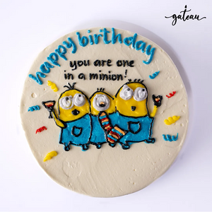 Custom minion birthday cake from Gateau Gourmet Cafe with three minions and happy birthday message