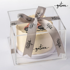 Custom new car cake from Gateau Gourmet Cafe beautifully presented in a clear display box