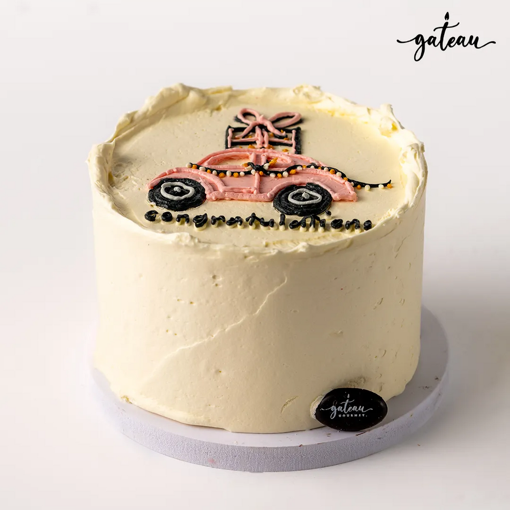 Custom new car cake with pink car design and celebratory message for special occasions