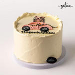 Custom new car cake with pink car design and celebratory message for special occasions