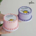 Two custom cakes with colorful frosting featuring custom photo cake toppers for special celebrations
