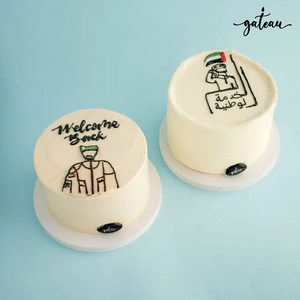 Two custom soldier cake designs by Gateau Gourmet Cafe with military-themed decorations