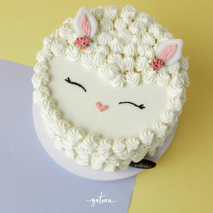 Cute sheep cake from Gateau Gourmet Cafe with fluffy frosting and adorable features