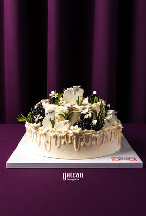 Gateau Gourmet Cafe white cake decorated with blackberries and cream for Eid Al Adha cakes delivery