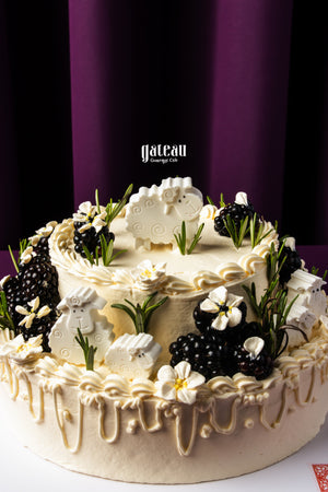Gateau Gourmet Cafe Eid Al Adha cakes delivery decorated with creamy white frosting blackberries and sheep-shaped fondant