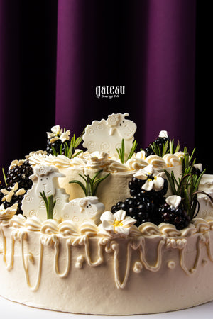 Gateau Gourmet Cafe Eid Al Adha cakes delivery featuring a festive sheep-themed cake with cream and blackberry decorations
