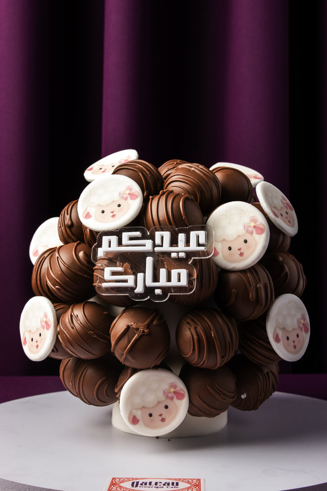 Gateau Gourmet Cafe Eid Al Adha chocolate truffles arranged in a decorative bouquet with sheep face designs