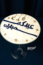 Eid celebration desserts from Gateau Gourmet Cafe featuring a beautifully decorated cake with festive designs