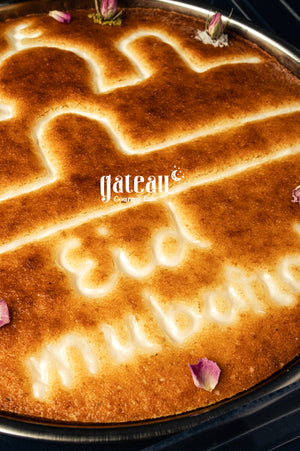 Eid Mubarak basboosa cake from Gateau Gourmet Cafe, decorated with a lovely design and rose petals