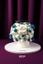 Father's Day cake bouquet from Gateau Gourmet Cafe with white cream and blue flower decorations