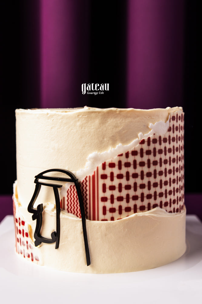 Father's Day cake by Gateau Gourmet Cafe with white frosting and unique red patterned design