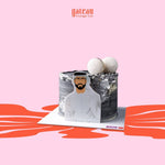 Gateau Gourmet Cafe Father's Day cake delivery with black frosting and decorative white macarons