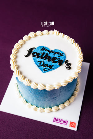Gateau Gourmet Cafe Father's Day mini cake with blue heart and Happy Father's Day text on white frosting