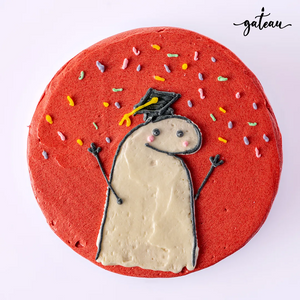 Flork Graduate Cake Design featuring a smiling character in a graduation cap with colorful sprinkles