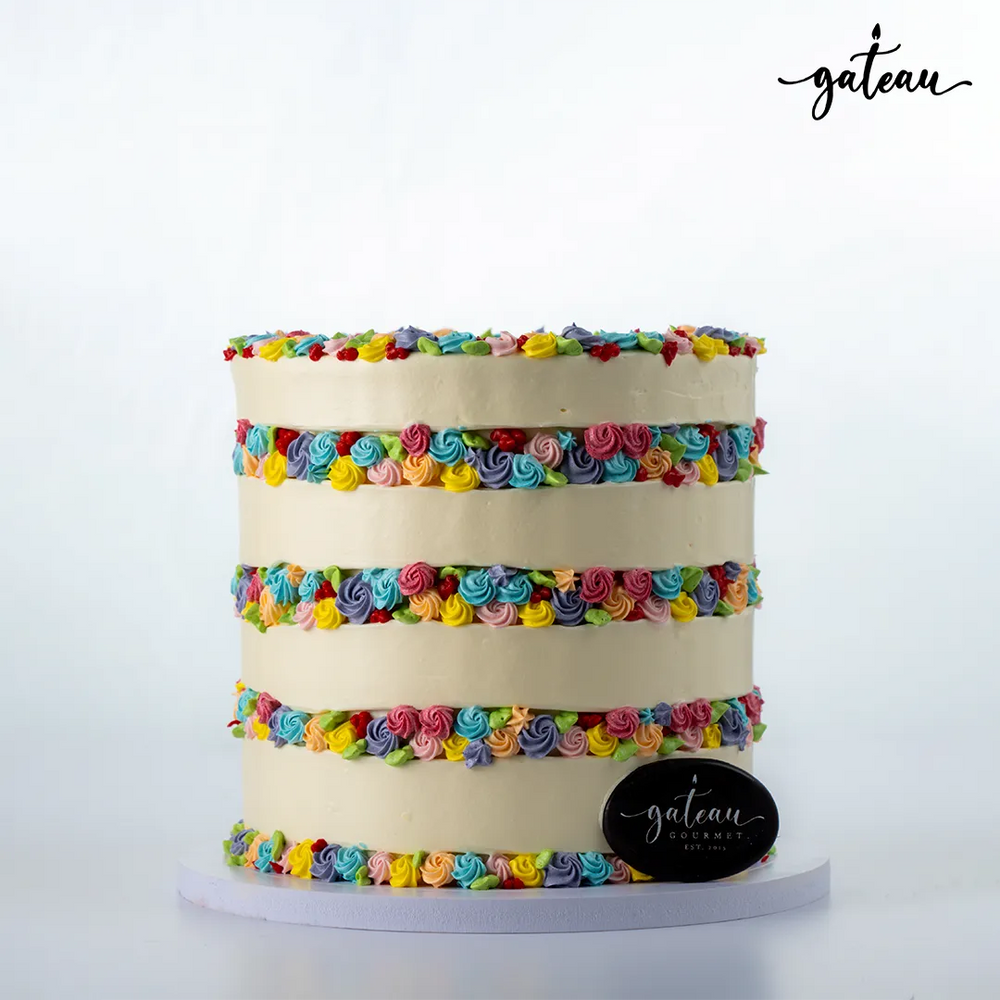 Flower Fault Line Cake by Gateau Gourmet Cafe Topped with Colorful Swirls and Layers