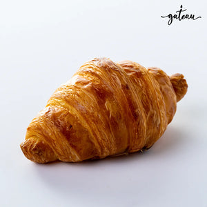Golden flaky fresh baked croissants delivery from Gateau Gourmet Cafe on white background