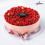 Gateau Gourmet Cafe fresh raspberry cheesecake delivery with fresh raspberries and decorative ribbon