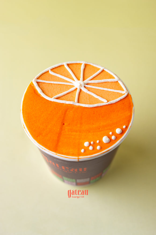 Fruit decorated cupcakes for parties with orange fruit design from Gateau Gourmet Cafe