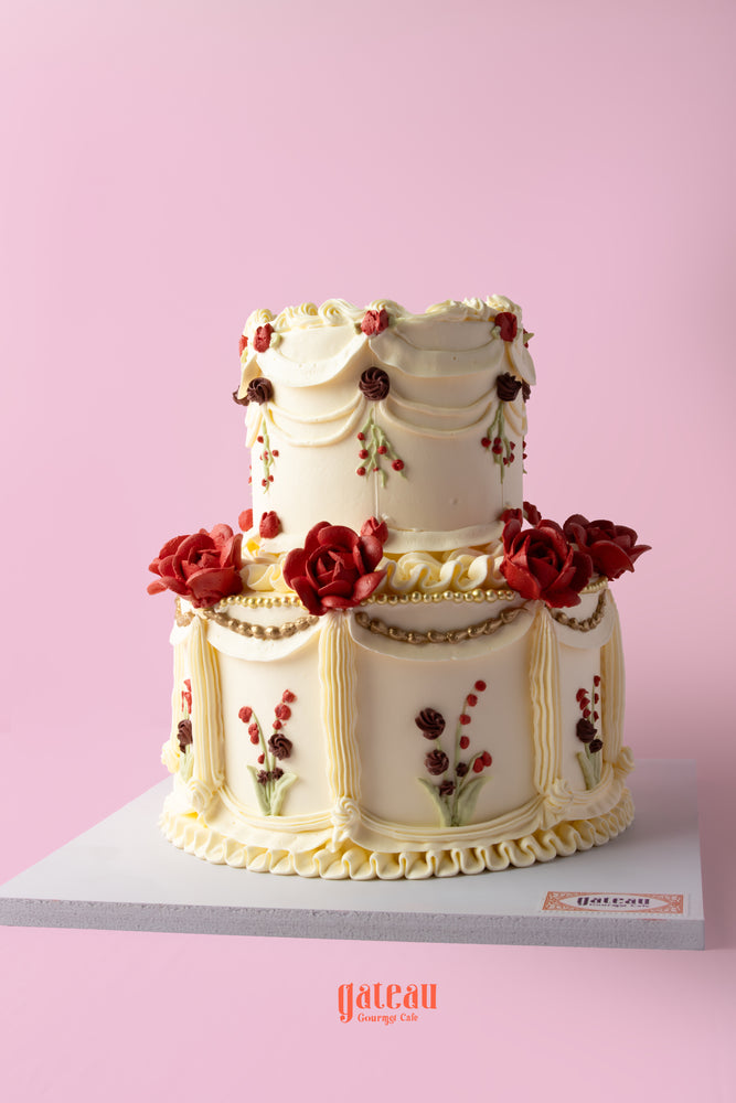 Garden of Memories cream cake with intricate floral decorations and elegant tiers from Gateau Gourmet Cafe