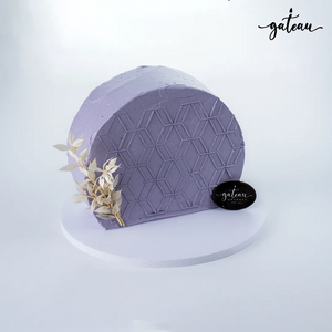 Purple Gibbous Cake with geometric pattern and dried flowers on white stand for Gibbous Cake delivery