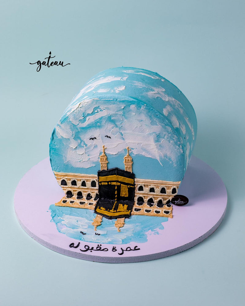 Gateau Gourmet Cafe cake featuring a detailed Gibbous Cake design with blue sky and architectural elements