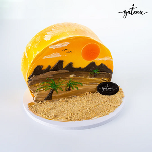 Gateau Gourmet Cafe Gibbous Cake design featuring a sunset desert scene with palm trees and sandy texture