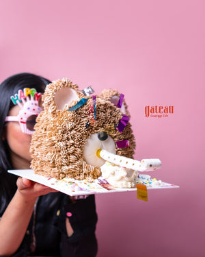 Gateau Gourmet Cafe Gibbous Cake unique design shaped like a bear head with party decorations