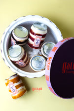 Assorted gourmet summer treats online in a decorative container from Gateau Gourmet Cafe