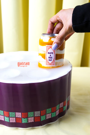 Delicious gourmet summer treats online featuring a layered dessert jar on a beautifully decorated cake