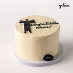 Gateau Gourmet Cafe graduation cake for boys with a graduation figure and celebratory message
