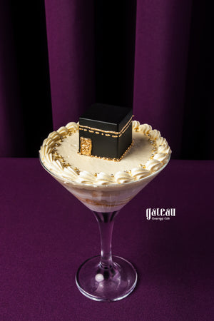 Hajj themed cake goblet from Gateau Gourmet Cafe with cream and black cube decoration in a glass