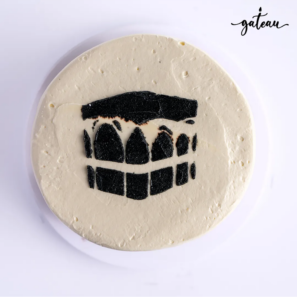 Gateau Gourmet Cafe Kaaba cake online order with black and white icing design on round cake