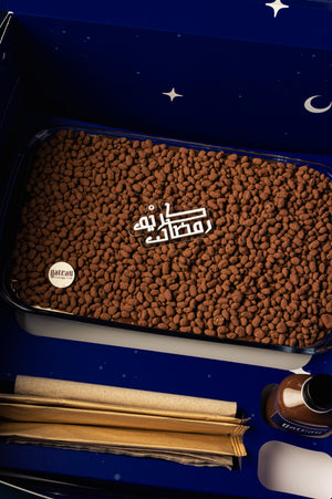 Krunchoco Delight cake from Gateau Gourmet Cafe topped with chocolate treats in a decorative box