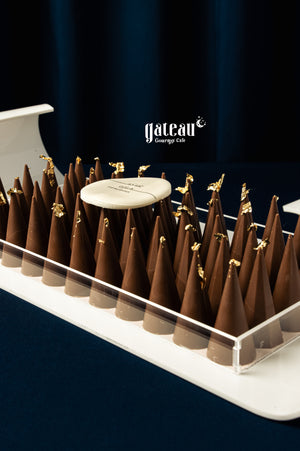Elegant kunafa pistachio dessert cones from Gateau Gourmet Cafe, beautifully arranged for special occasions