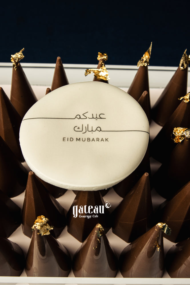 Eid Mubarak cake from Gateau Gourmet Cafe featuring kunafa pistachio design and gold accents