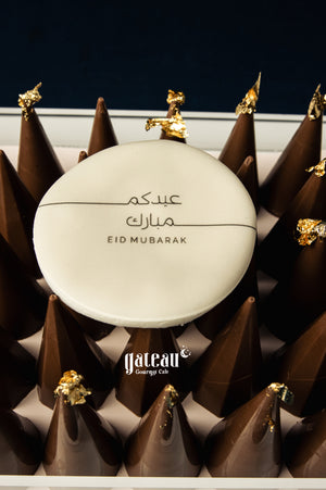 Eid Mubarak cake from Gateau Gourmet Cafe featuring kunafa pistachio design and gold accents