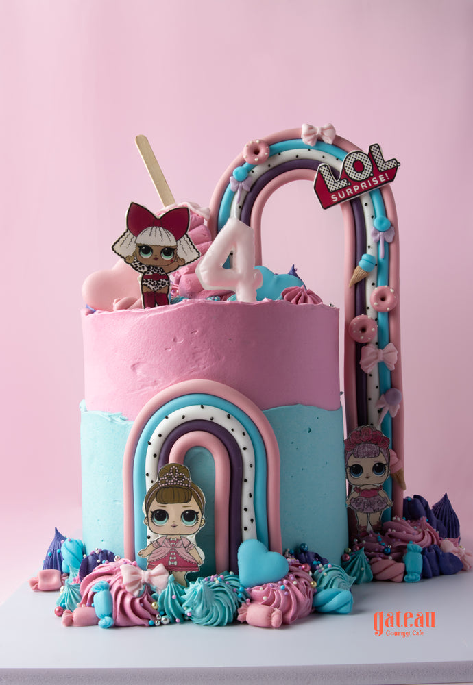 Colorful L.O.L. Surprise birthday cake decorated with playful characters and fondant details