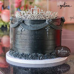Elegant luxury crown cake with intricate detailing and a sparkling tiara on top from Gateau Gourmet Cafe