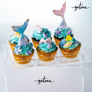 Gateau Gourmet Cafe mermaid theme cupcakes with blue frosting and detailed mermaid tail decorations