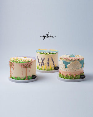Gateau Gourmet Cafe midnight garden mini cake with floral and nature-inspired icing decorations