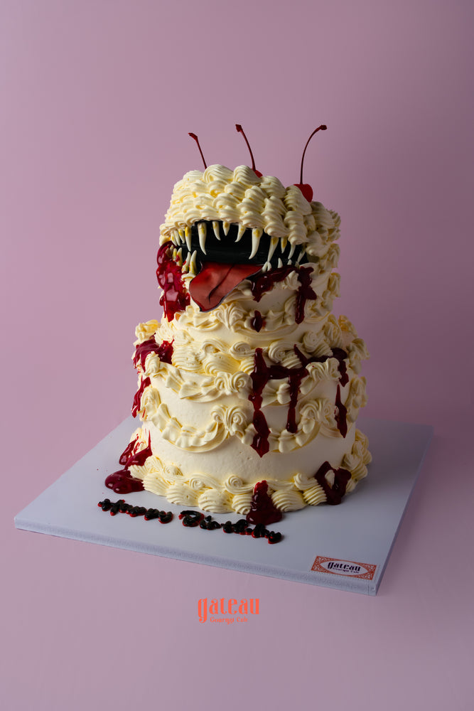 Mimic monster cake from Gateau Gourmet with colorful frosting and playful design for celebrations